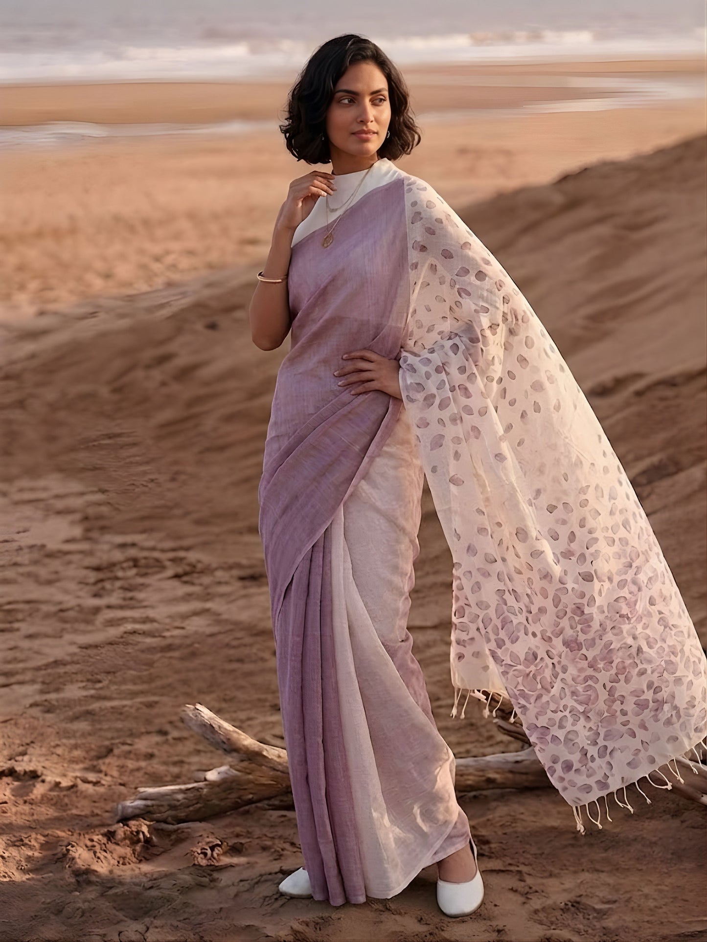 Dusty Rose Saree, a handwoven silk cotton saree featuring a mauve dual-tone body and delicate floral eco-prints on the palla by Soulweaves.