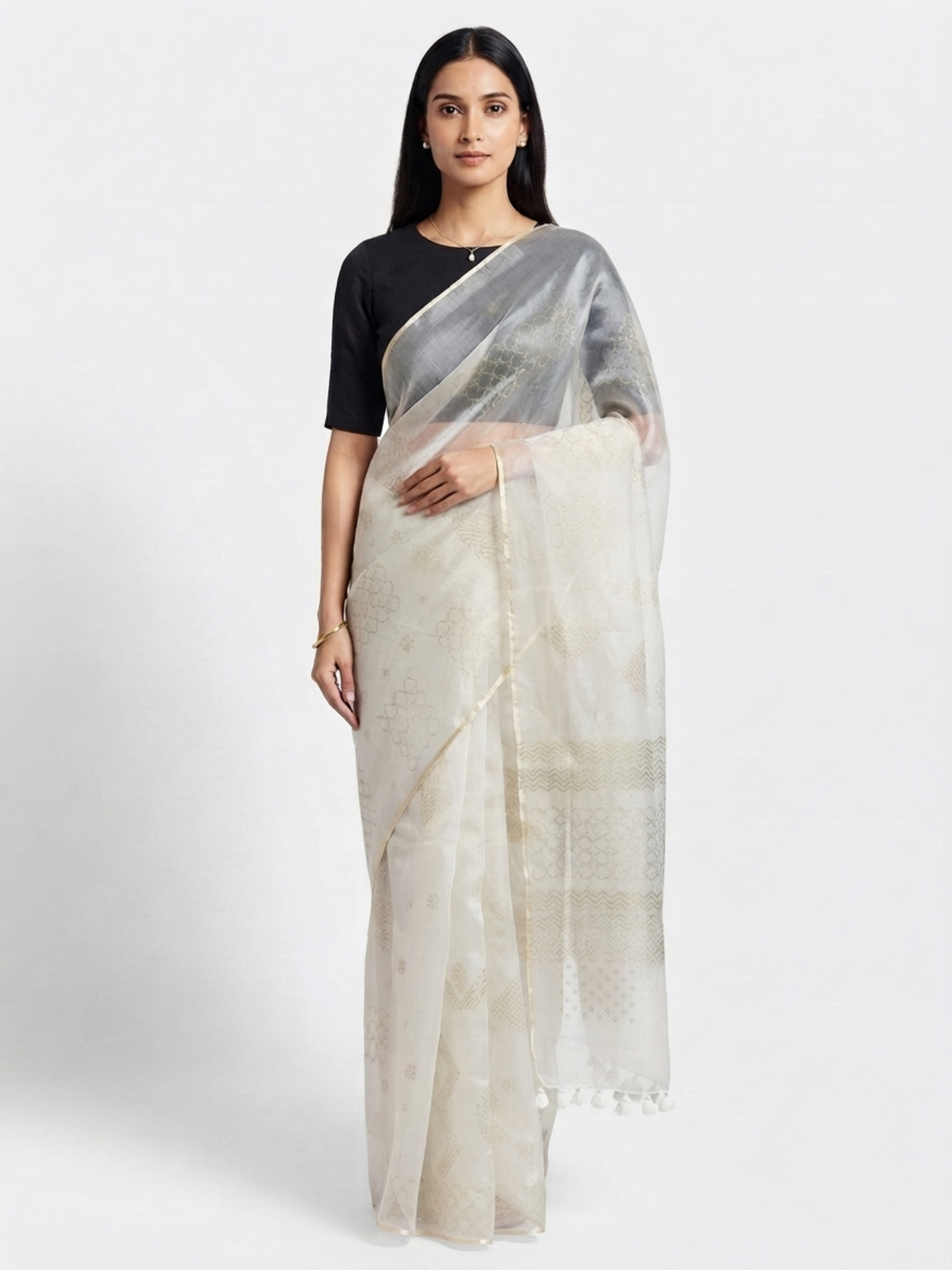 SoulWeaves Chandini ivory organza silk saree with delicate geometric motifs and subtle golden border.