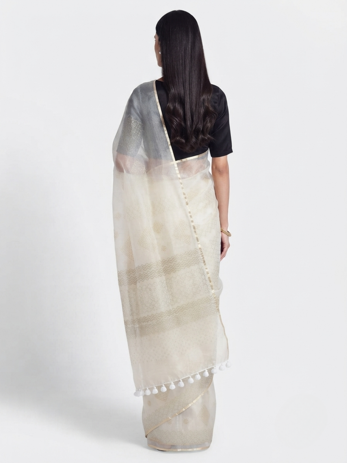 SoulWeaves Chandini ivory organza silk saree with delicate geometric motifs and subtle golden border.