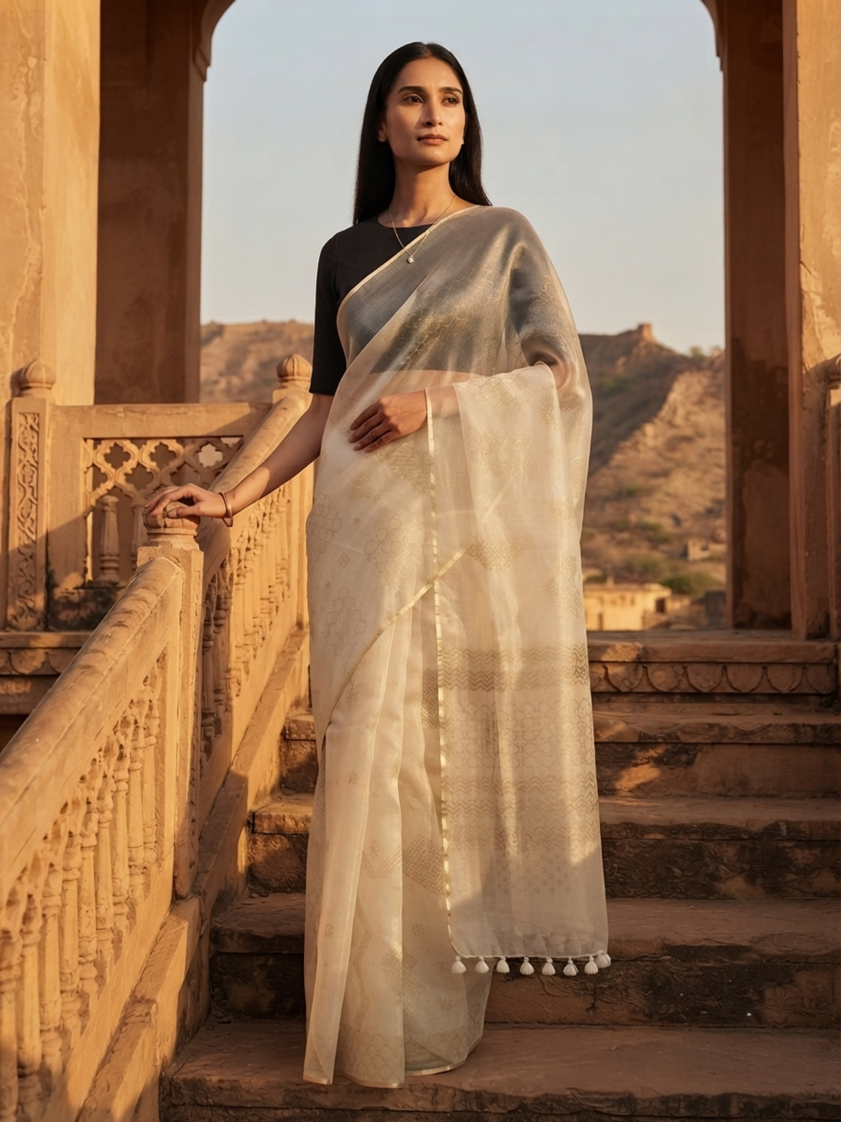 SoulWeaves Chandini ivory organza silk saree with delicate geometric motifs and subtle golden border.
