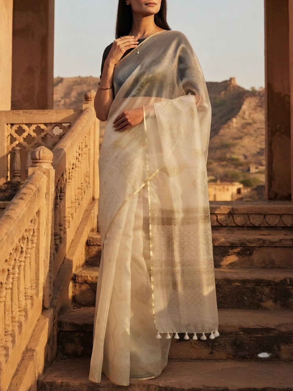 SoulWeaves Chandini ivory organza silk saree with delicate geometric motifs and subtle golden border.